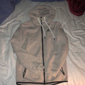 Nike Tech Hooded zipper-up sweater.
